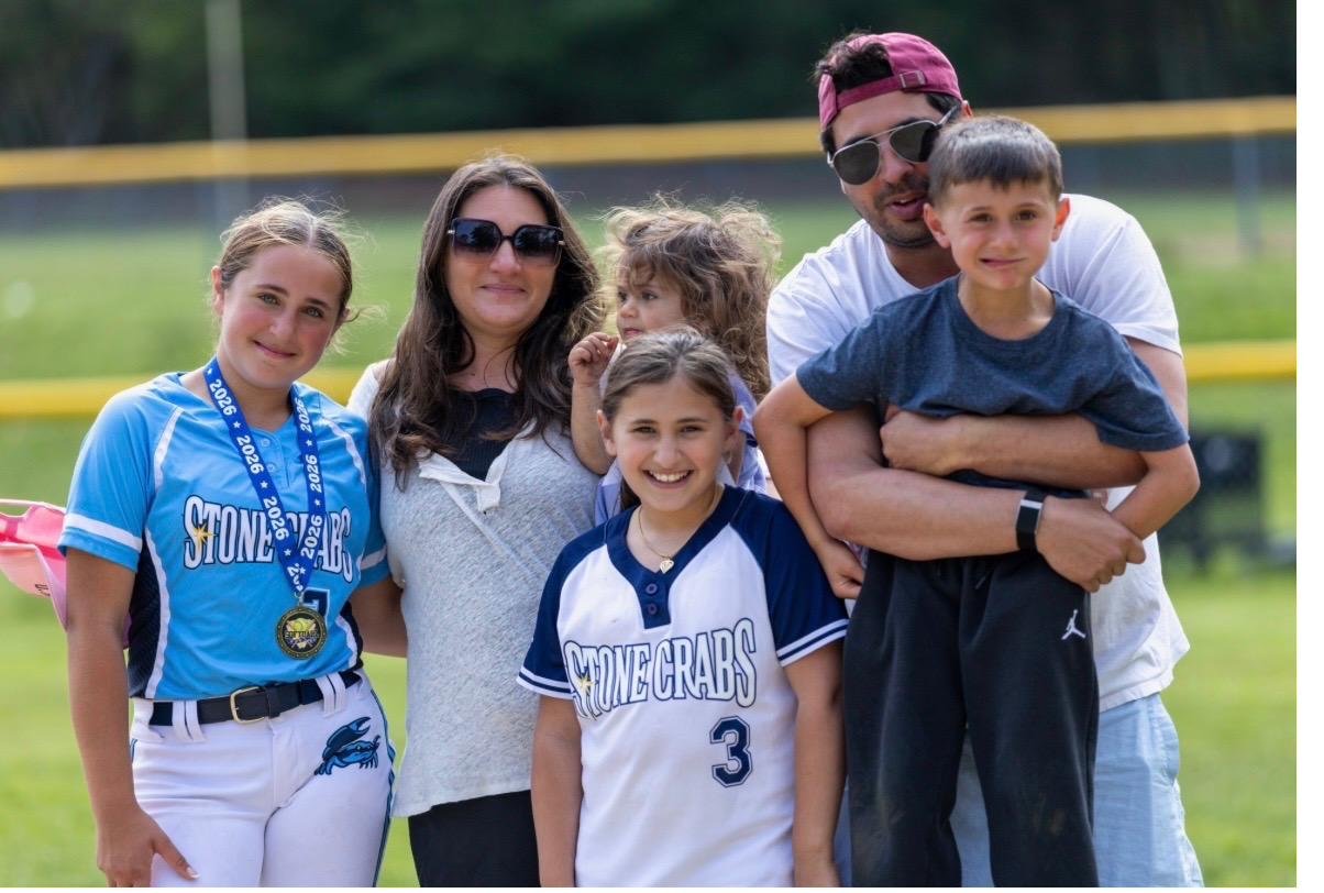 Michael "Lou" Riley with his kids at a Scituate softball game